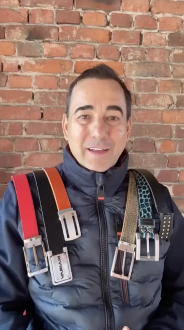 Bian Variani wearing several of his handmade leather belts